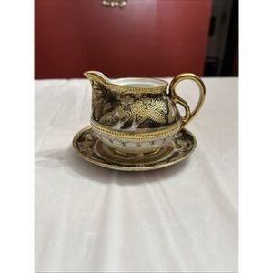 Nippon Hand Painted Creamer And Saucer